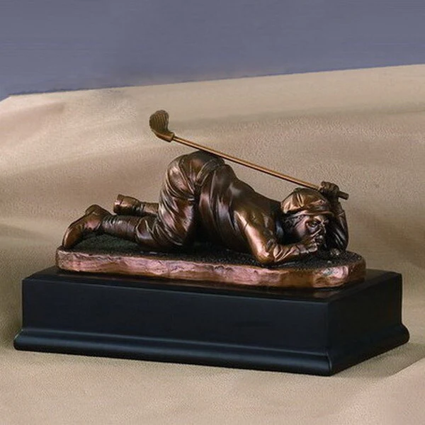 Golfer Sizing Up His Shot Sculpture
